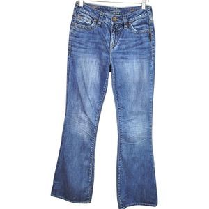 Silver Suki Flare Jeans  Dark Wash with distressing/whiskering W 27/L33